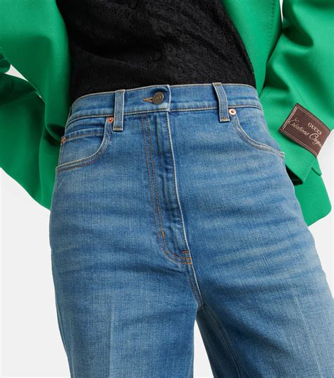 low-rise mid-blue flared jeans by gucci|gucci tapered jeans.